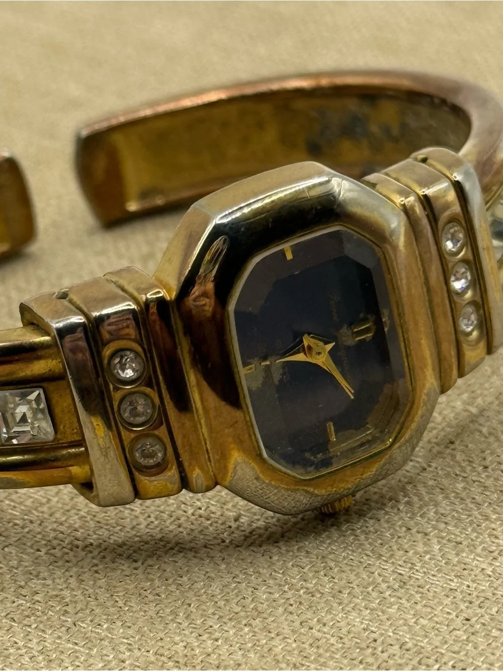 Pierre Jacquard Gold Tone Cuff Watch Rhinestones Metal Band Blue Octagon Dial